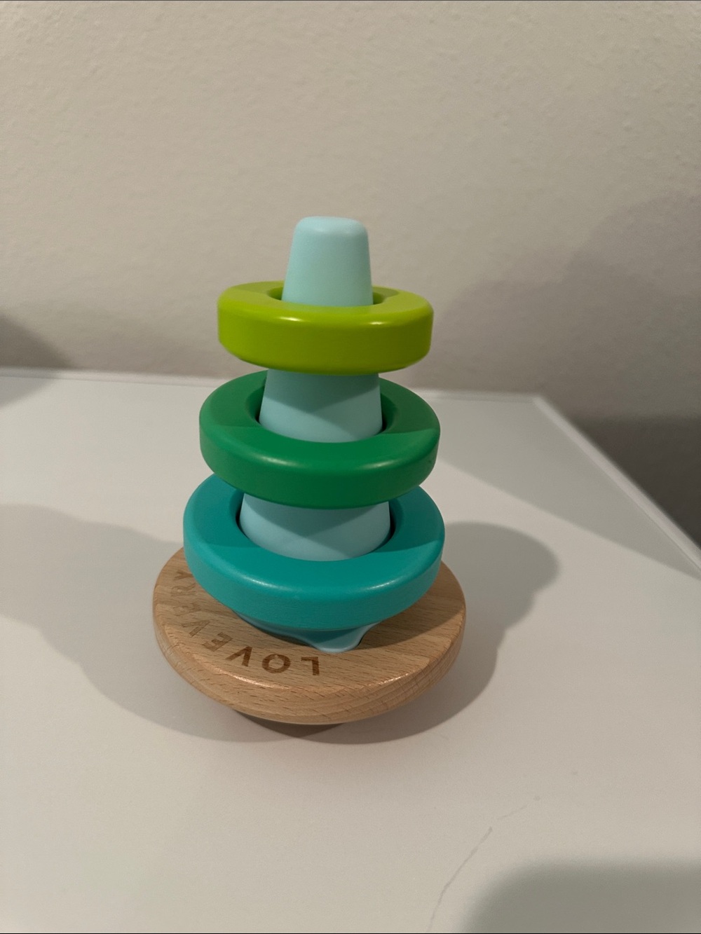 Lovevery Wooden Stacking Rings Toy in Mint, Teal & Lime